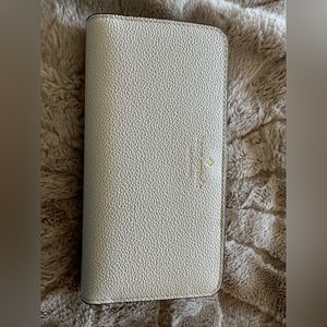 New , beige leather pebbles Kate spade wallet.